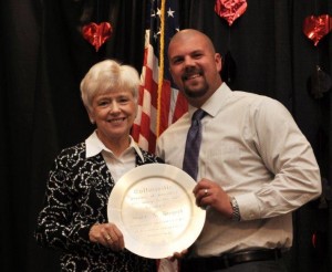 Joyce Biegert is presented the Spirit of Excellence Award by Matt Wyatt, Chamber Board President / Photo by Rick Owens