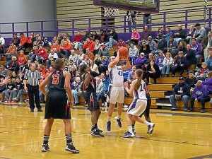 Kassidy Smith goes up for a basket against Edwardsville on Dec. 9 / Photo by Roger Starkey