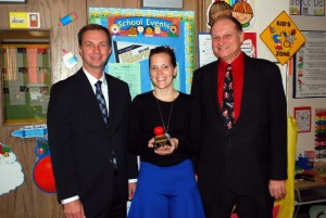 Edward Jones Unit 10 Teacher of the Month for December, Sarah Palau.  Left to right: Rick Kincheloe of Edward Jones, Palau and Caseyville Elementary School Principal David Stroot / Submitted Photo
