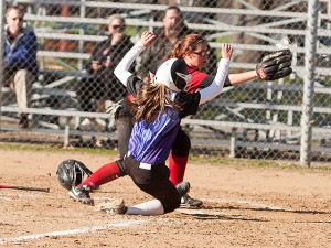 Emily Lautz slides in to home safely / Photo by Sherry Holten