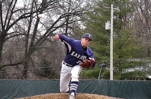 Zach Mathes pitches against Mascoutah on April 4, 2014 / Photo by Roger Starkey