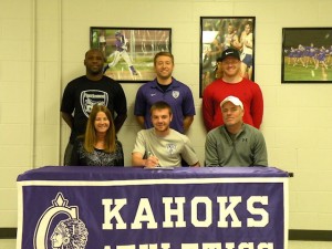 Alex Lamoreaux will continue his soccer career at Fontbonne University. Kelly, his mother is seated to his right and Jeff, his father, to his left. Standing, left to right: Ricky Andrews (Associate Head Coach at Fontbonne), Myles Hensler (CHS Head Coach) and Luke (Alex's brother)