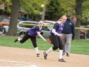 Audrey Allard throws the ball to first base while Samantha Buettner looks on / Photo by Sherry Holten
