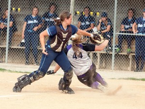 Samantha Buettner slides home safely / Photo by Sherry Holten