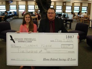 Sabrina Flohr, scholarship winner, with Ron Shambaugh, president and CEO of Home Federal Savings & Loan / submitted photo