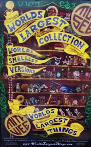 A poster advertising the World's Largest Collection of the World's Smallest Versions of the World's Largest Things / Photo by Rachel Heston-Davis